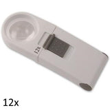 White, round lens hand held magnifier with grey on/off switch on rectangular handle labeled 12x.