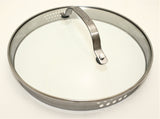Silver pot lid with clear top and sliver handle with holes on the side for pouring.